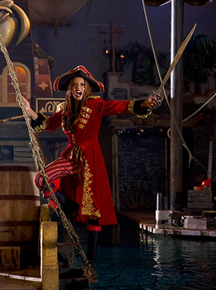 pirates swinging from ropes at Pirates Voyage